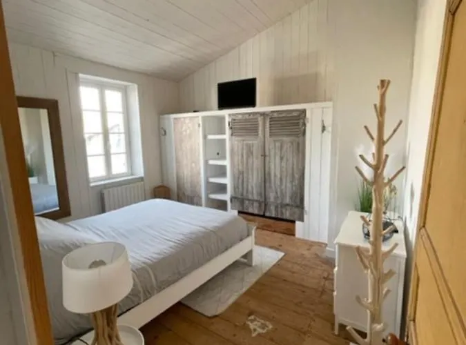 House In The Center And Near The